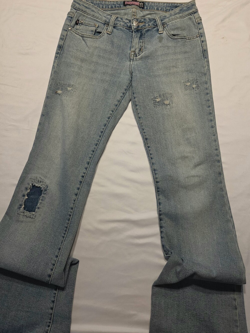 Bubblegum Light Blue Flare Jeans with Distressed Details